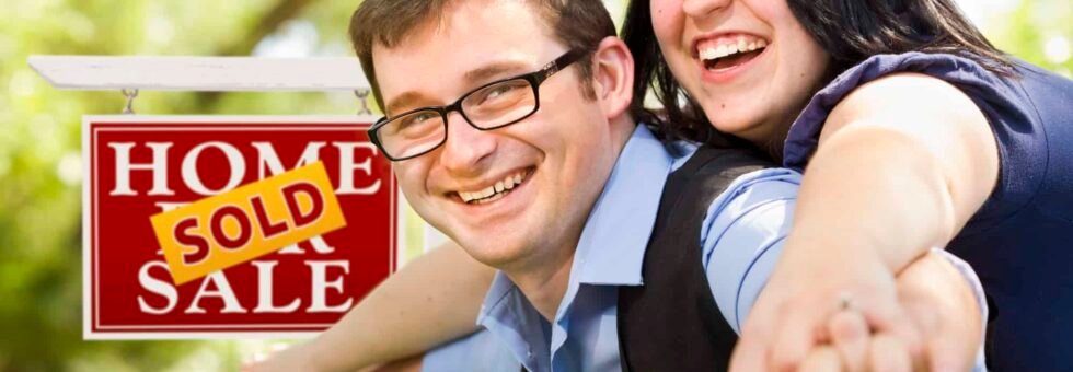 Happy Couple just sold their home.